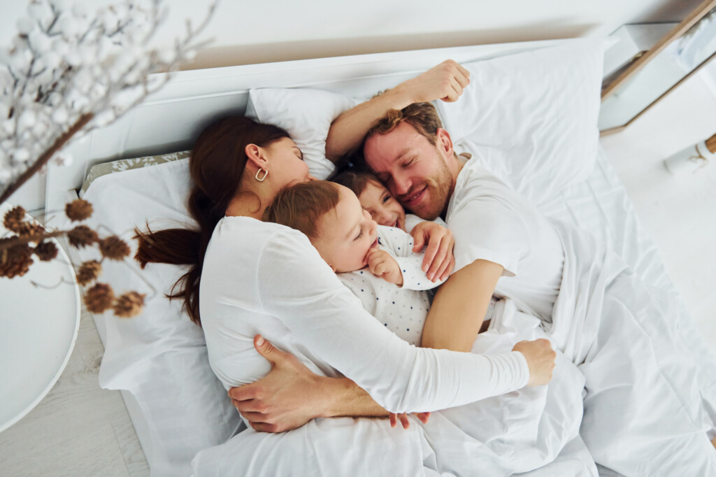 Happy People with a New Mattress